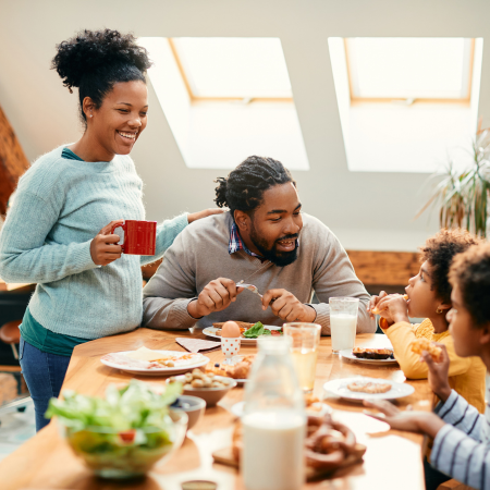 woman eating with family